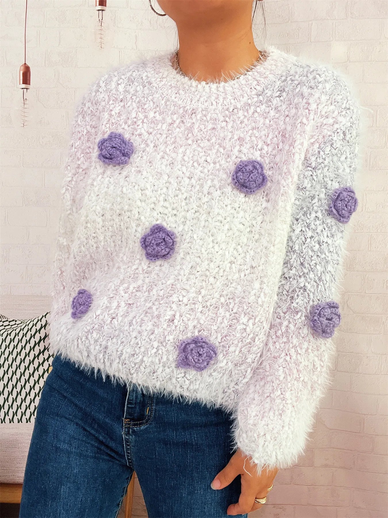 Flower-embellished round-neck sweater, fuzzy white knit with purple rosette appliques