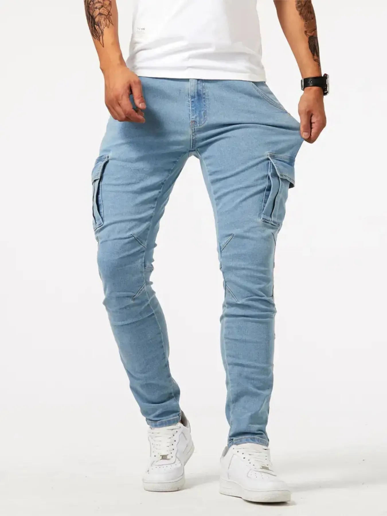 Light blue slim cargo jeans with side cargo pockets and zipper fly