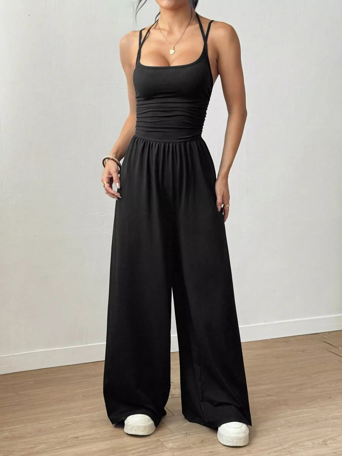 Ruched spaghetti-strap wide-leg jumpsuit, black with gathered waist and wide pant legs