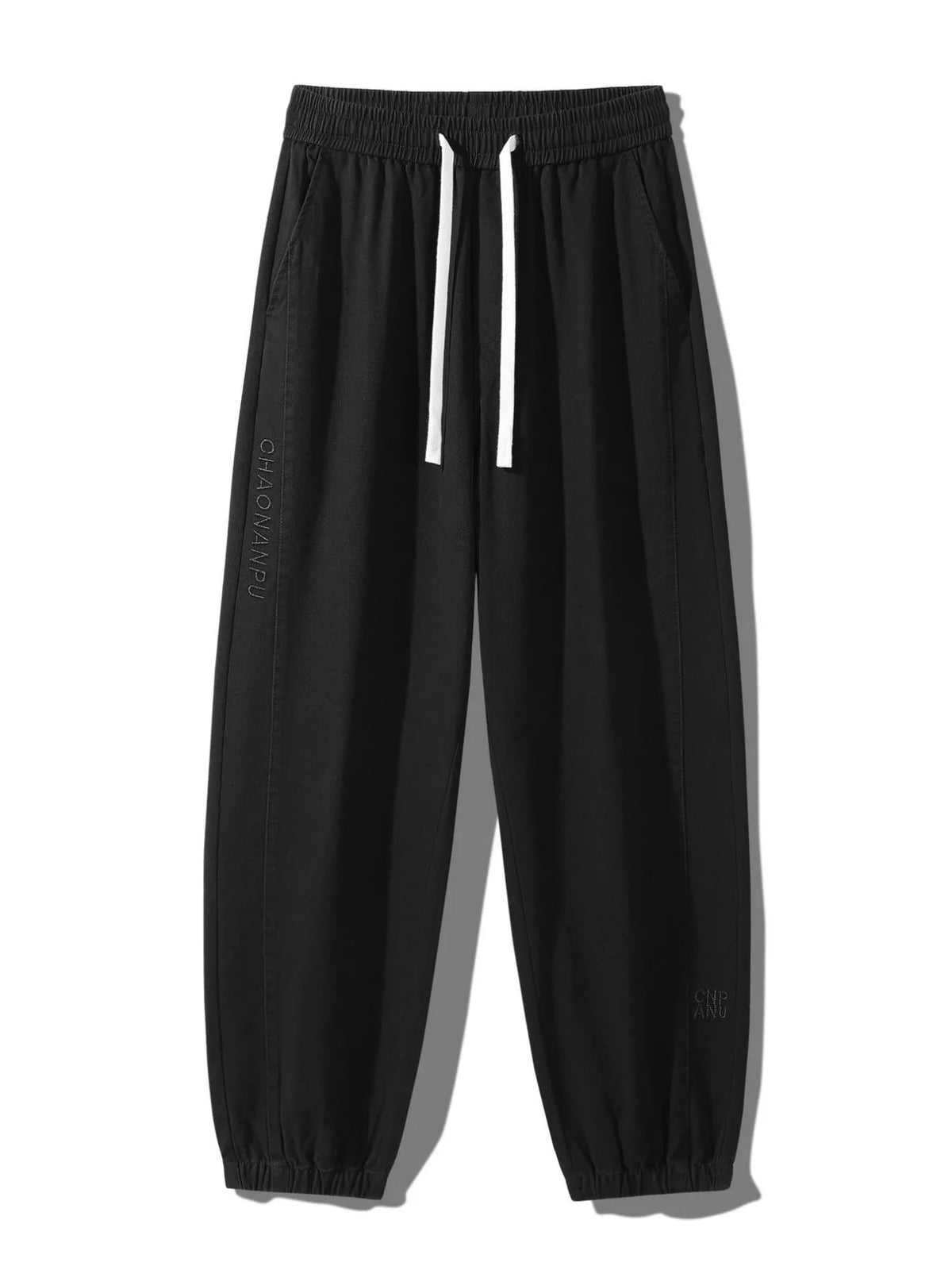Men's casual loose-fit black jogger pants with drawstring and side pockets