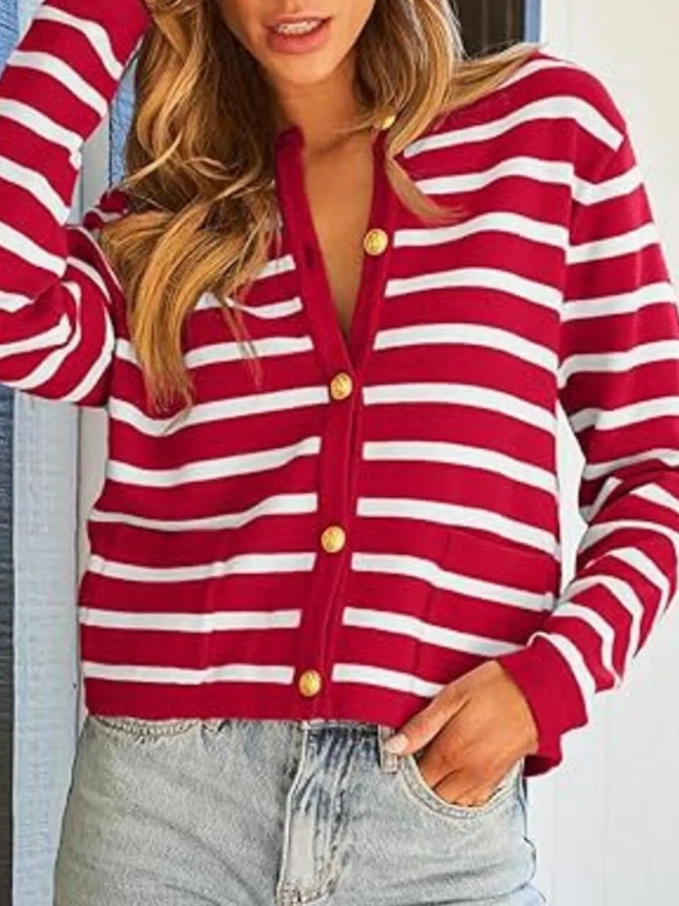 Red and white striped button-up cardigan with gold button placket and V neckline