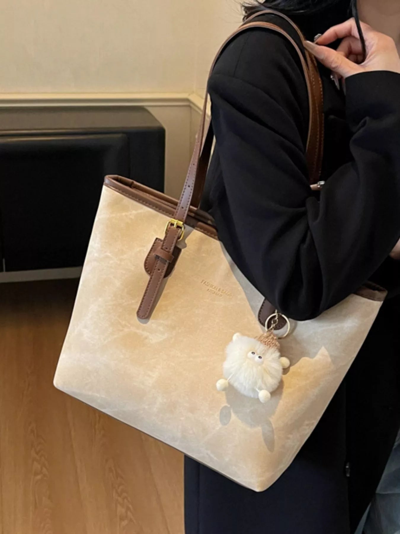 Shoulder bag with plush charm, medium PU beige bag with brown straps.