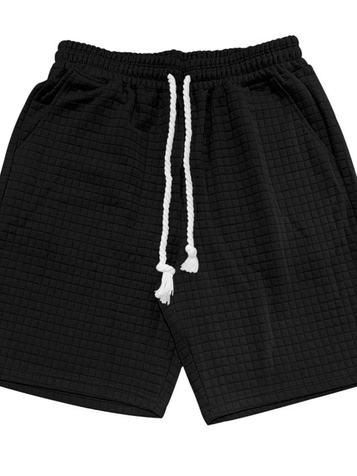 Black drawstring shorts with elastic waistband and textured knit fabric