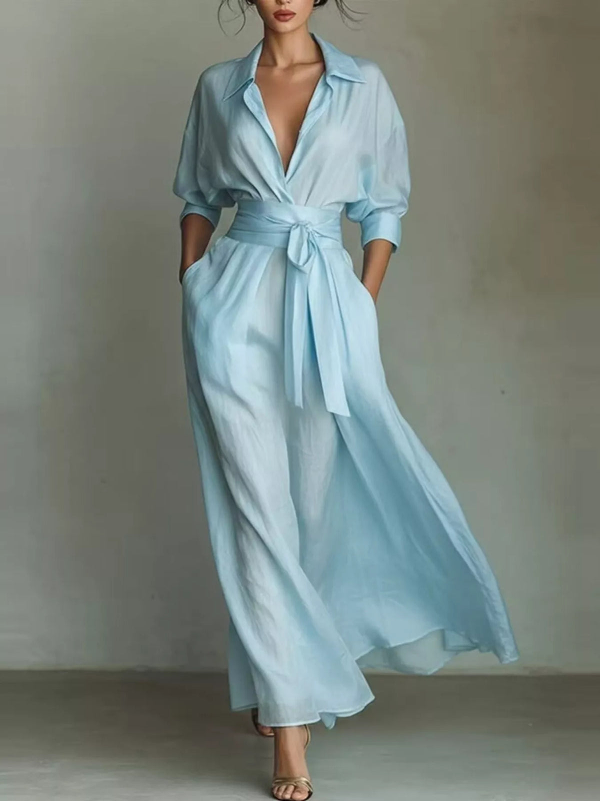 Sky blue maxi shirt dress with tie waist sash and button front, puff sleeves