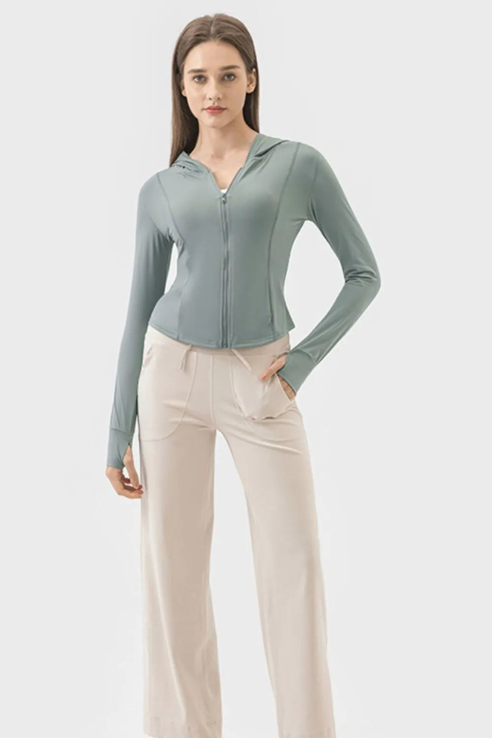 Teal zip-up hooded active jacket with front zipper and long sleeves