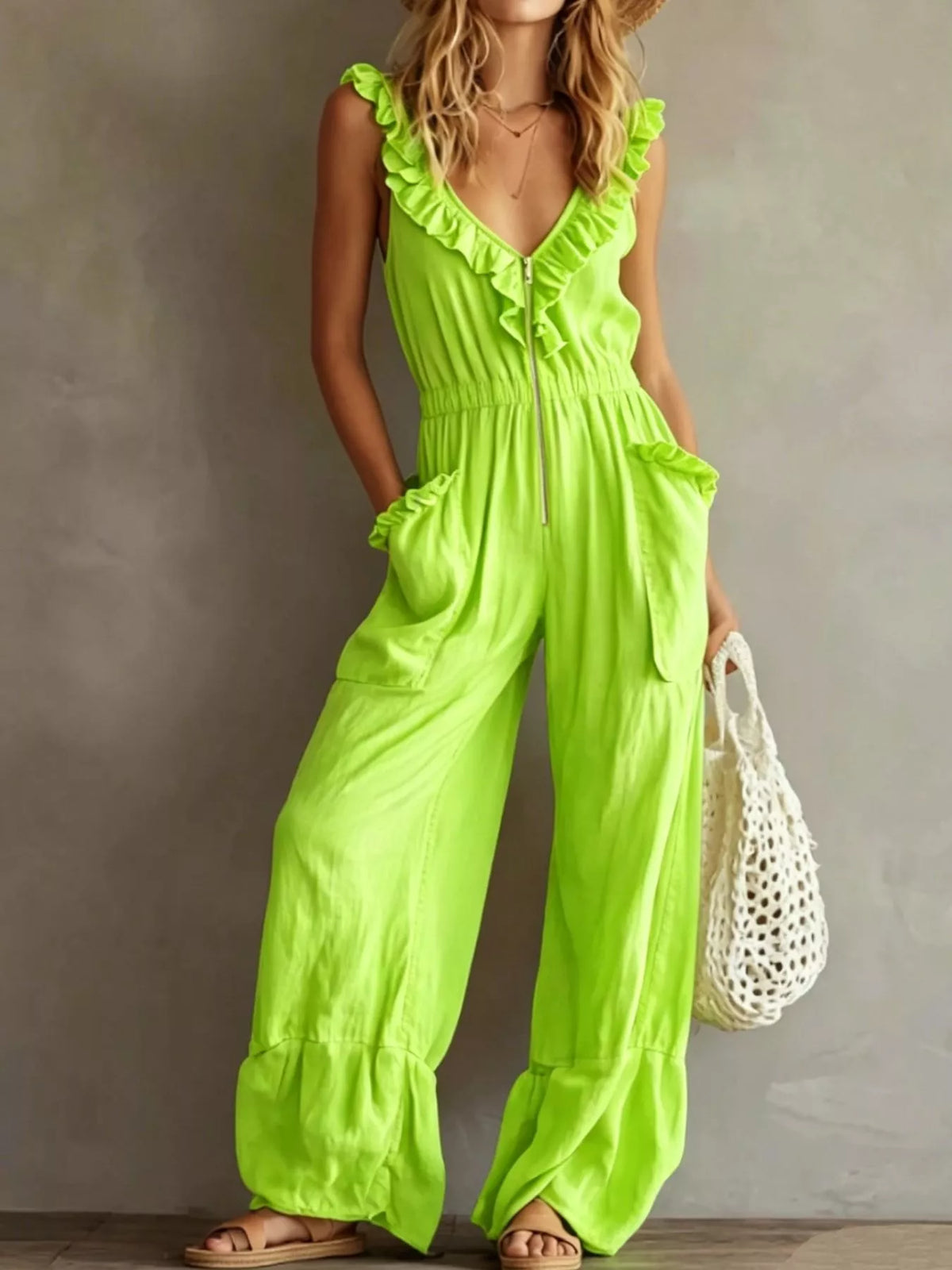 Bright lime green ruffled V-neck sleeveless jumpsuit with tie front and wide-leg fit