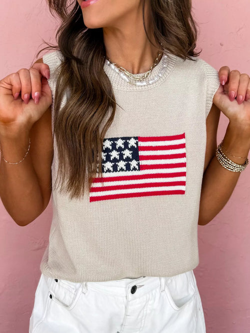 Beige knit sweater vest with American flag graphic on the front