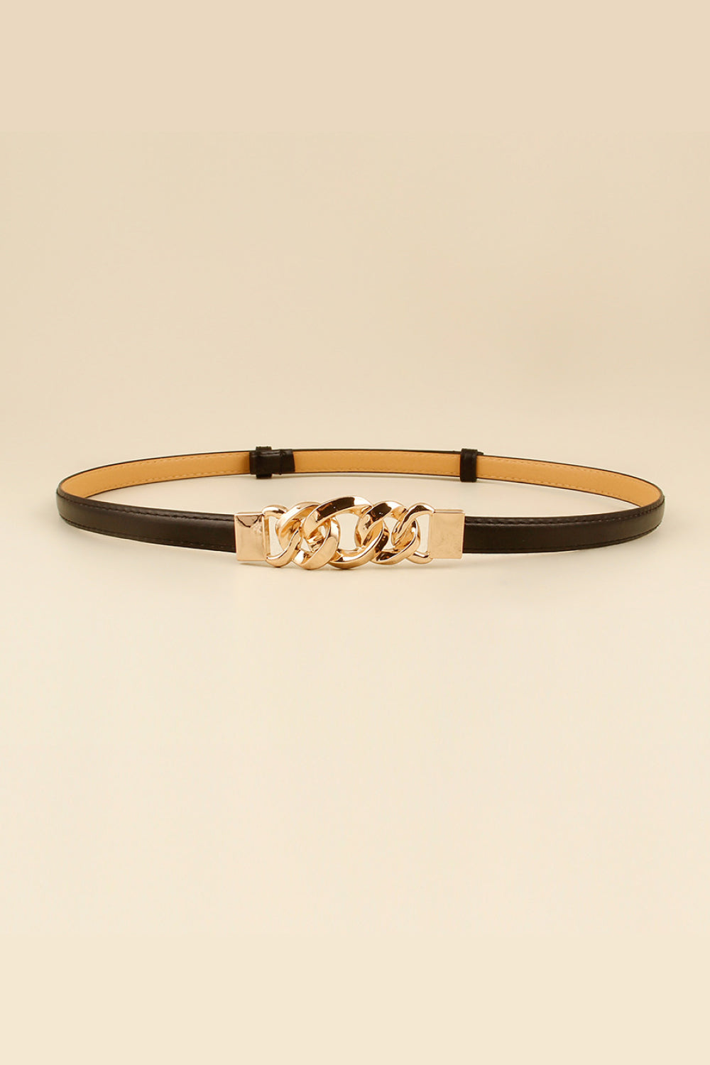 Skinny vegan leather belt with gold chain-link buckle, dark brown strap