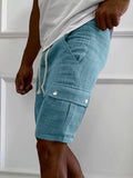 Men’s light blue cargo shorts with drawstring waist and buttoned side cargo pocket.