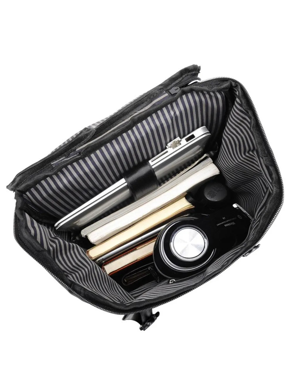 Black multi-pocket backpack interior with striped lining and zippered compartments