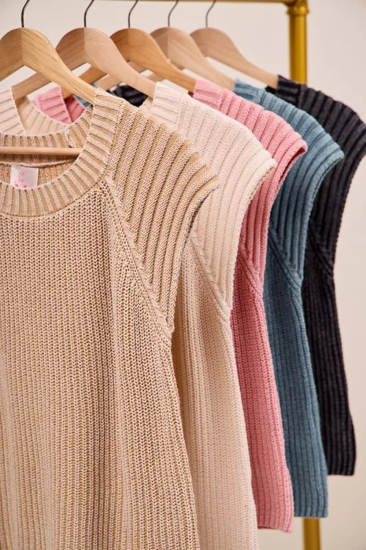 Sleeveless raglan knit sweater top on hangers, ribbed crew neck; multiple colors