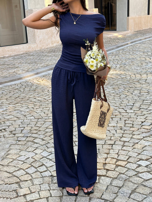 Navy asymmetrical neck sleeveless top and wide-leg pants set with drawstring waist