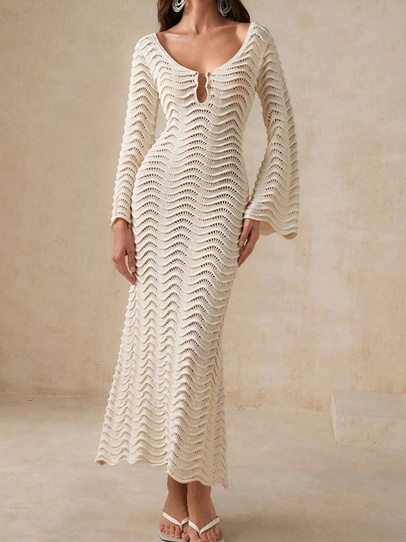 Apricot openwork crochet maxi knit dress with long sleeves and wavy chevron texture