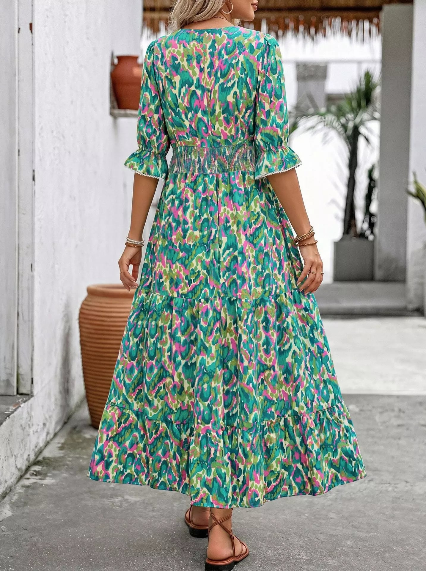 Cedar & Moore Printed V-Neck Flounce Sleeve Dress in green teal pink abstract print with smocked waist and tiered skirt