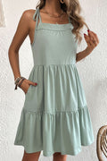 Light green tie-shoulder tiered dress with square neckline and layered skirt