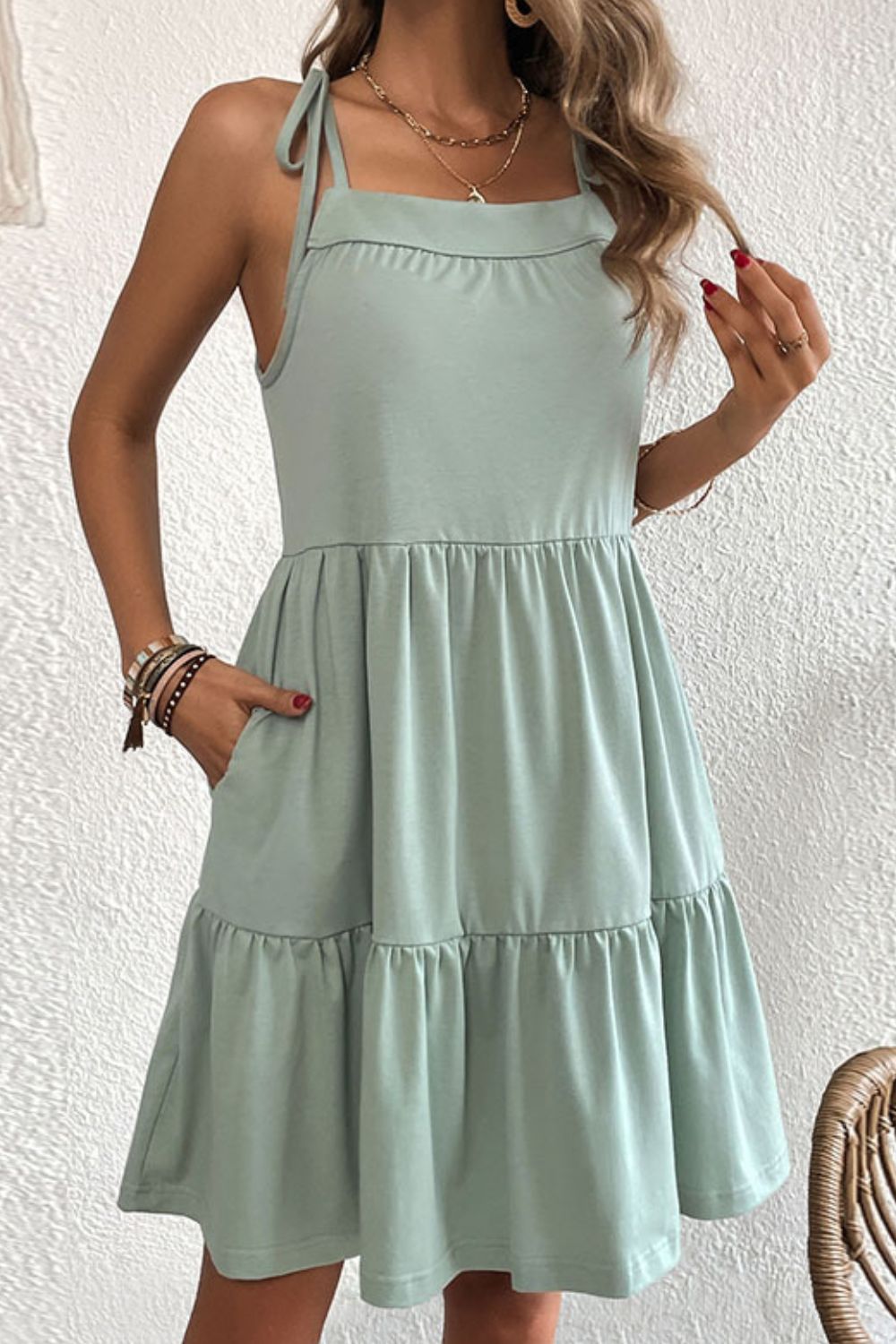 Light green tie-shoulder tiered dress with square neckline and layered skirt