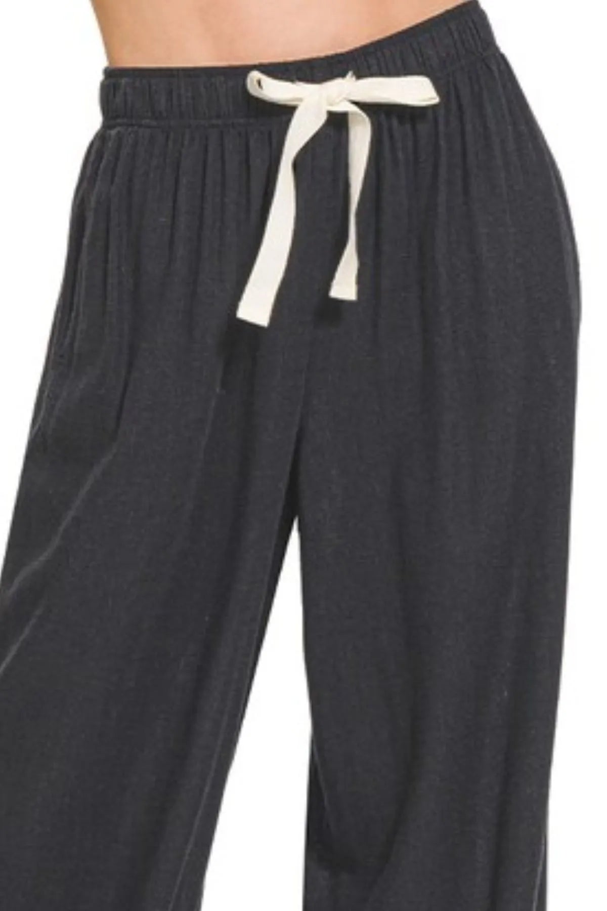 Black linen drawstring pants, elastic waistband and tie front detail
