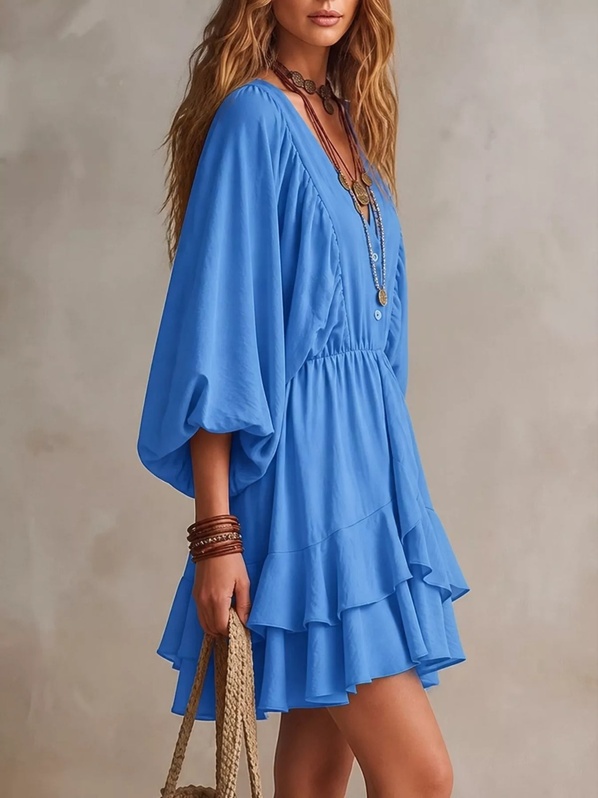 Blue tiered mini dress with balloon sleeves and layered ruffle hem