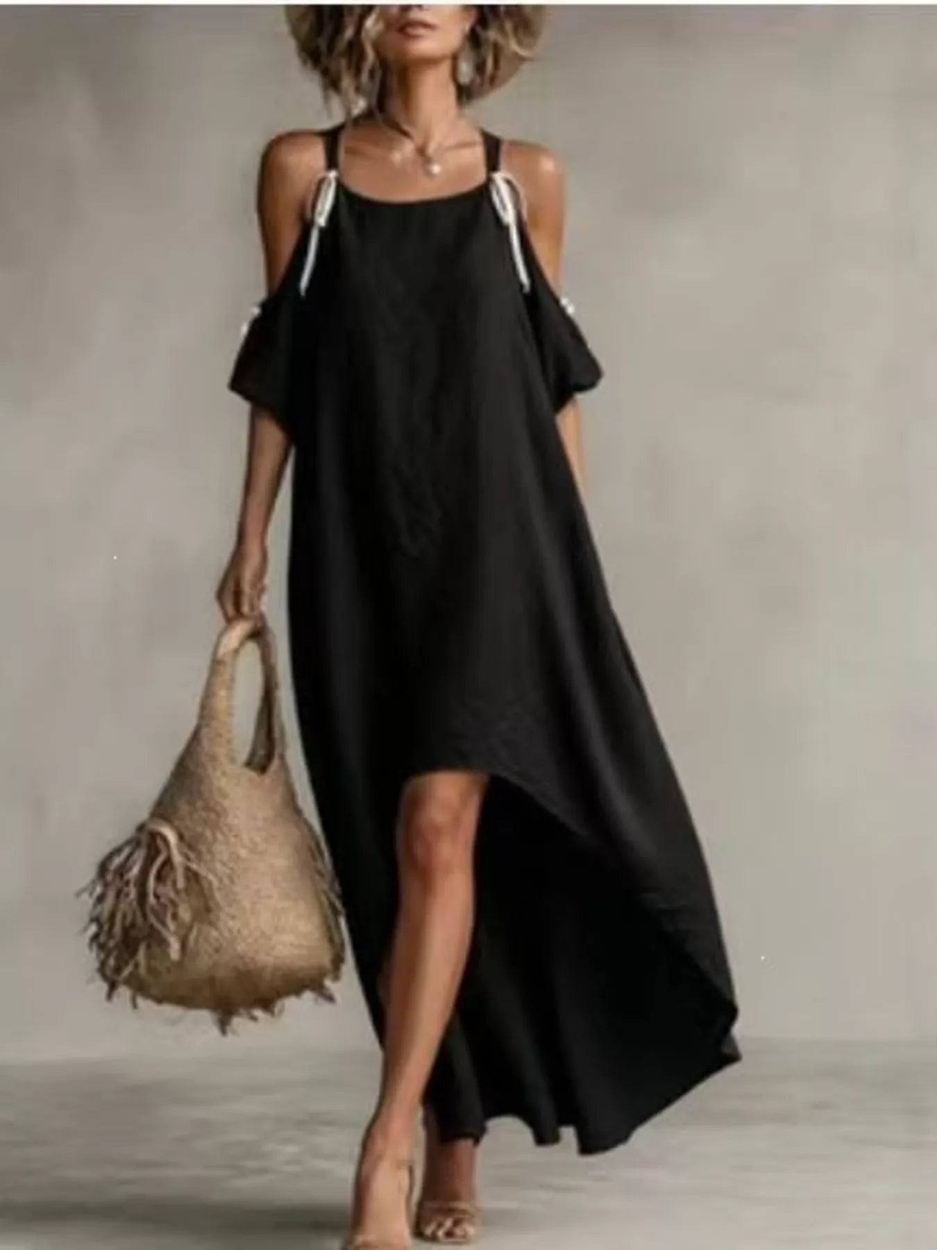 Black cold-shoulder high-low maxi dress with tie shoulder cutouts and asymmetrical drape hem