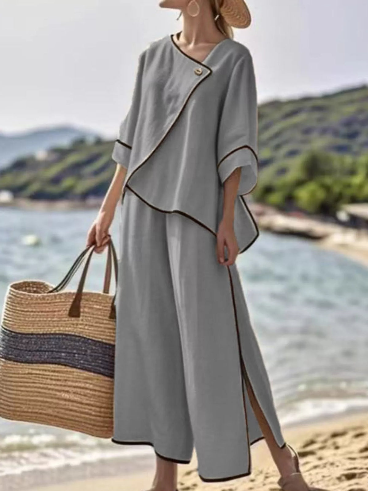 Grey two-piece pants set with contrast trim, draped button top and wide-leg pants
