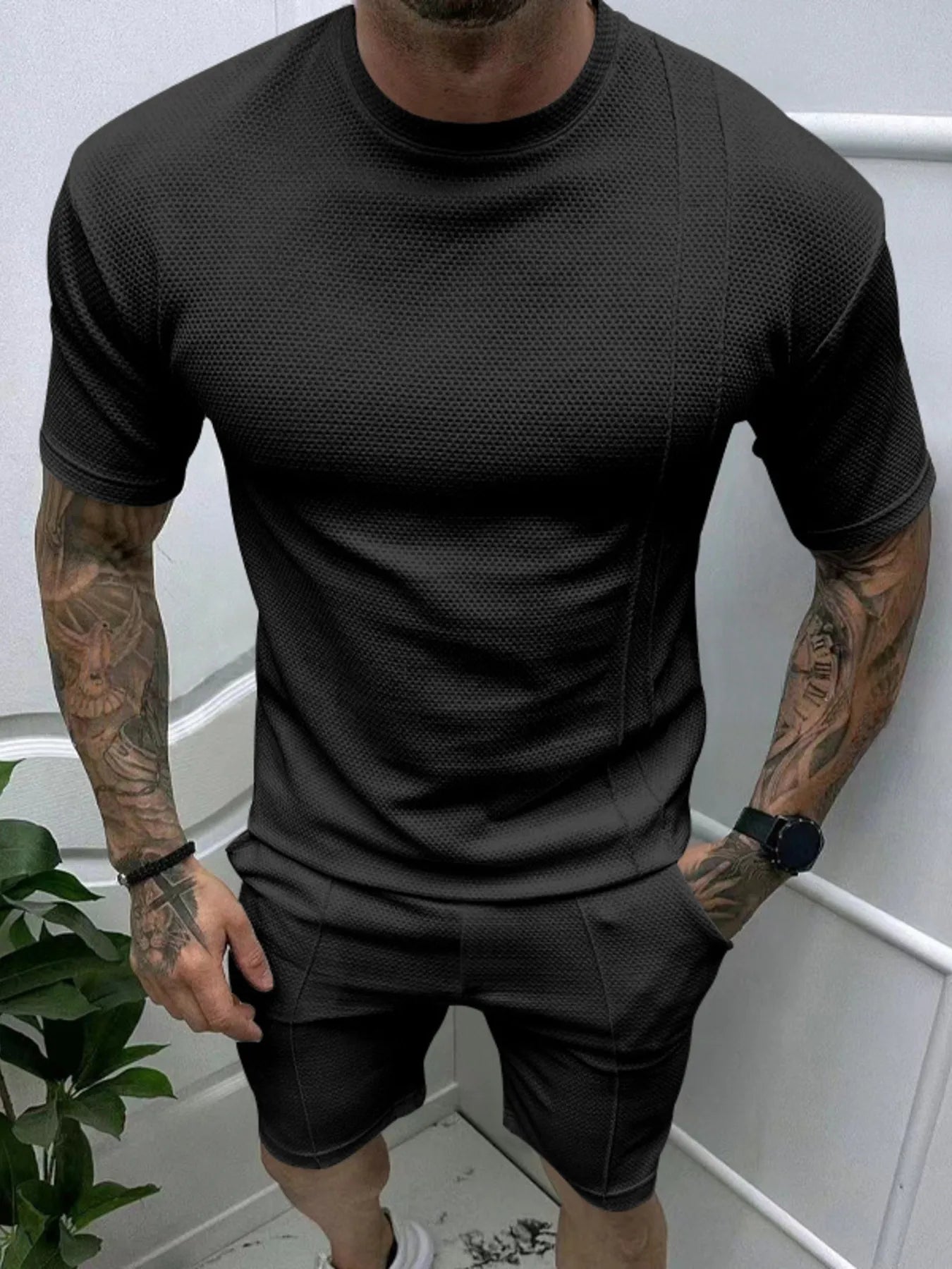 Black men's round-neck tee and elastic-waist shorts set
