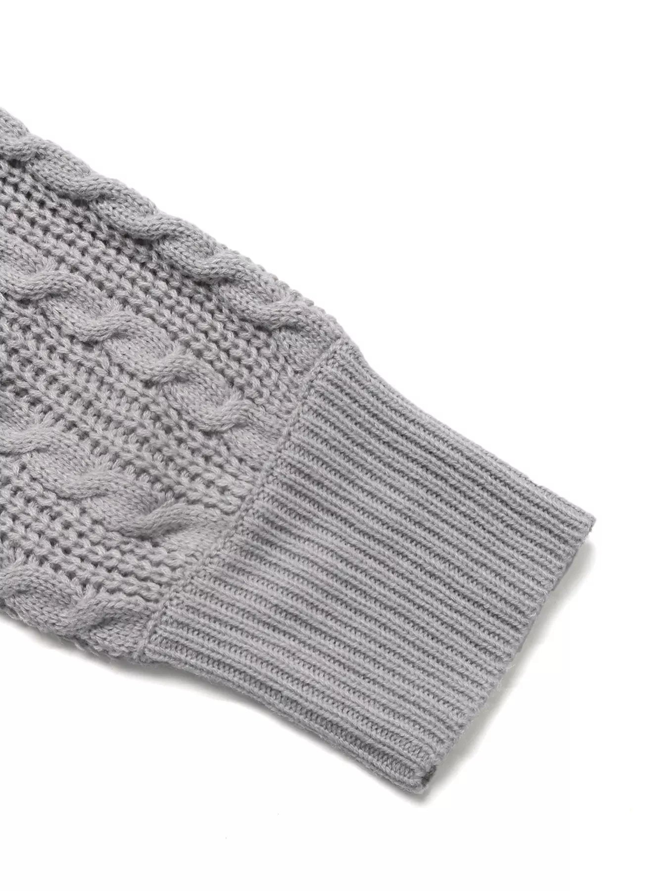 Gray cable knit sweater sleeve cuff with ribbed edge