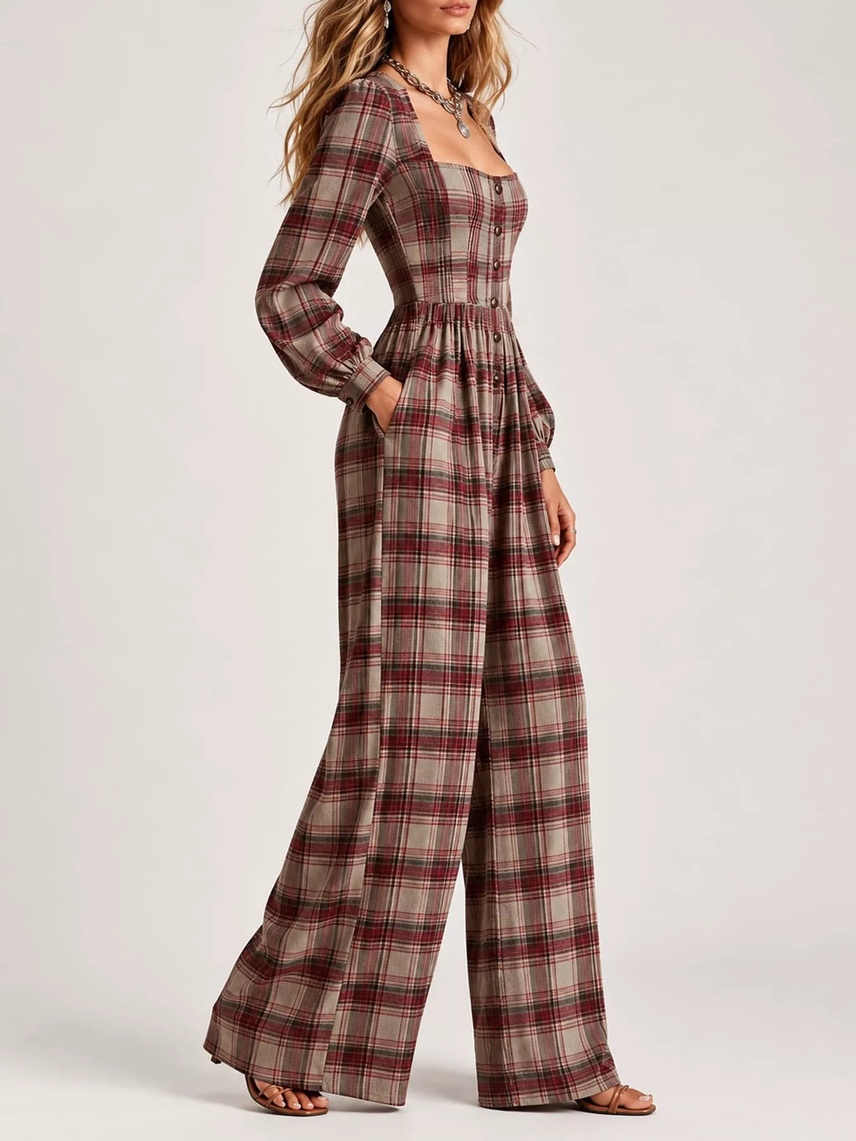 Red plaid square-neck long-sleeve jumpsuit with gathered waist and wide-leg pants