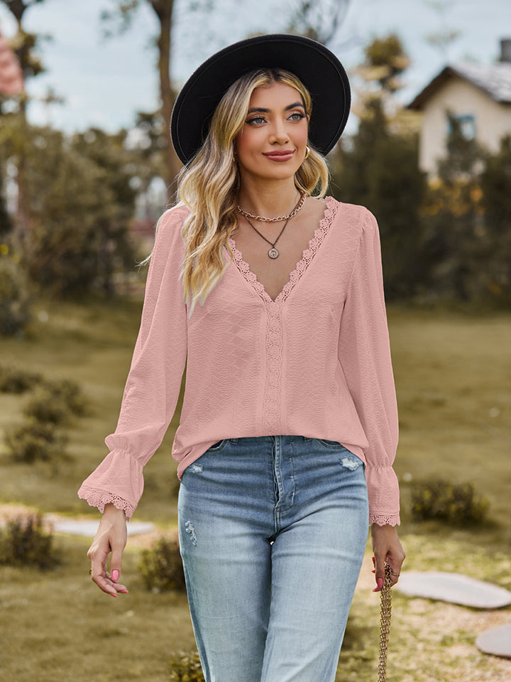 Flounce-sleeve blouse in blush pink, V-neck with lace trim and textured front