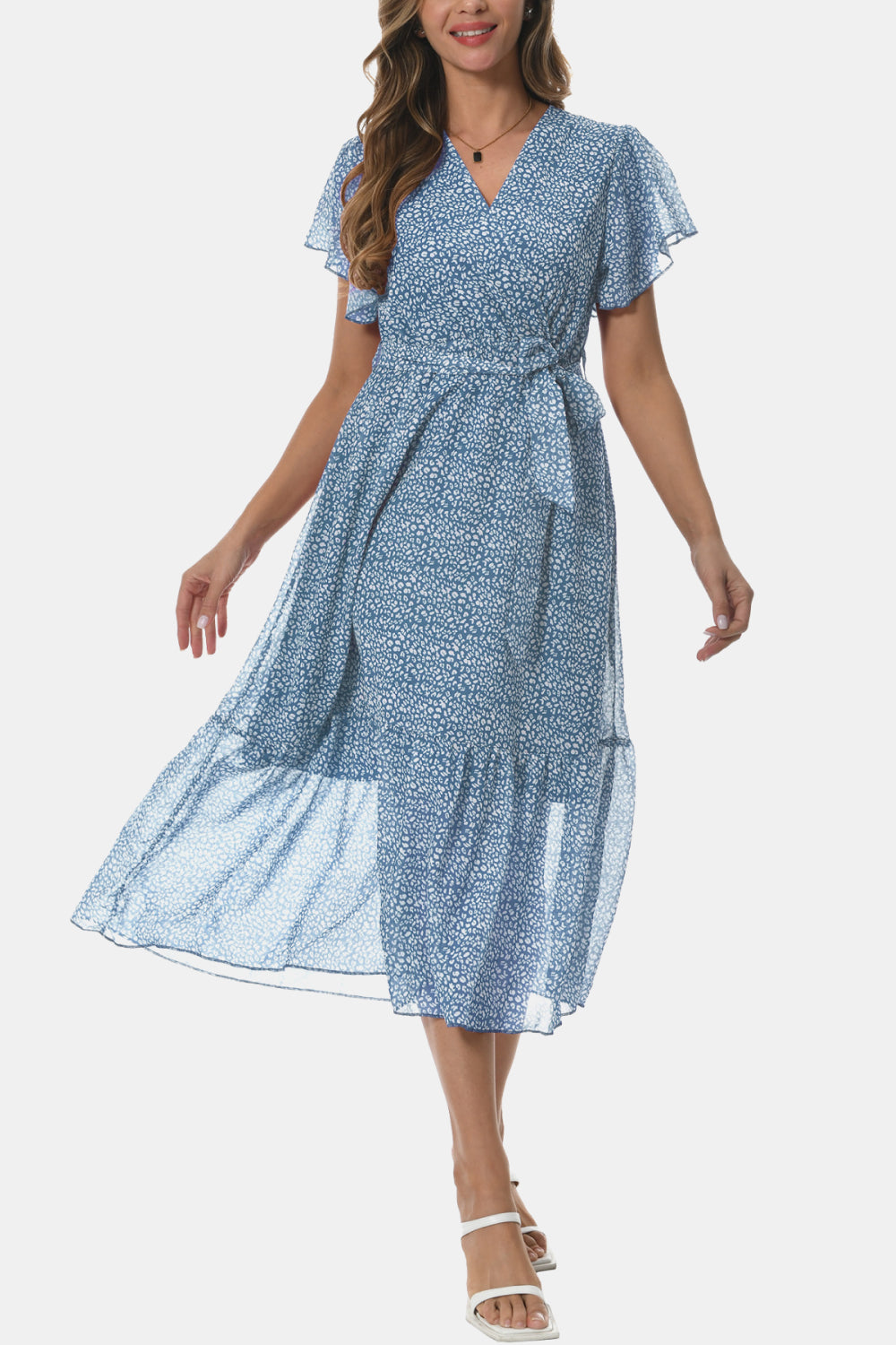 Light blue surplice V-neck tied dress with flutter sleeves and flowing tiered hem