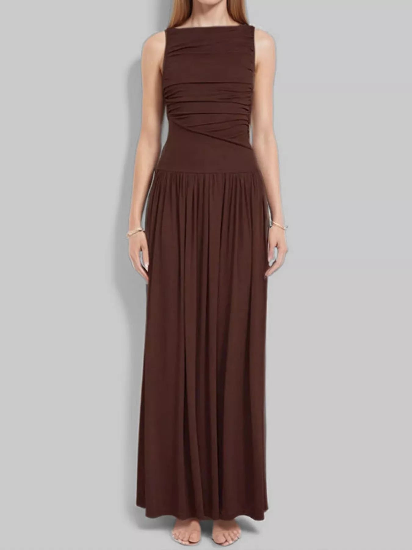 Brown ruched sleeveless maxi dress with draped bodice and pleated long skirt