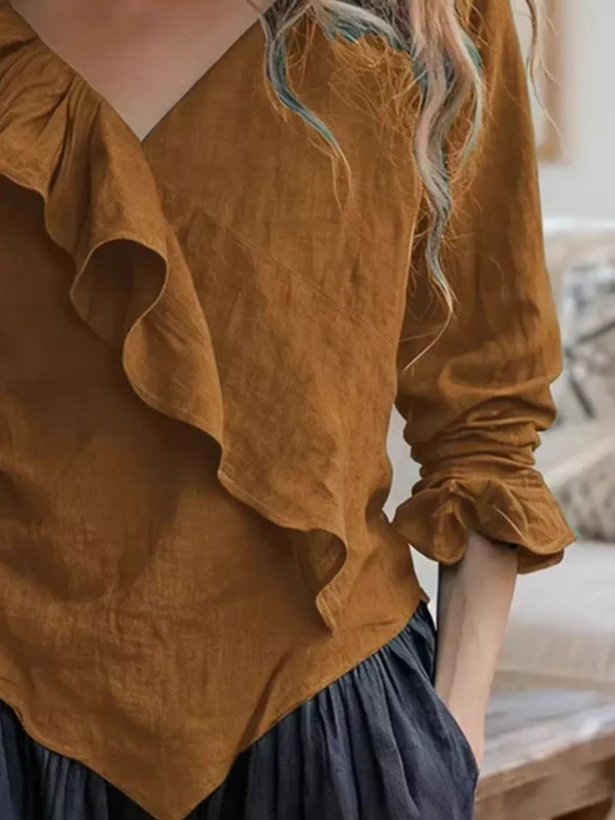 Caramel ruffled V-neck blouse with long sleeves, layered front ruffle, peplum hem