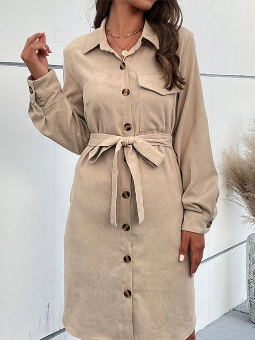Tan button-front tie-waist shirt dress with gathered waist tie and long sleeves