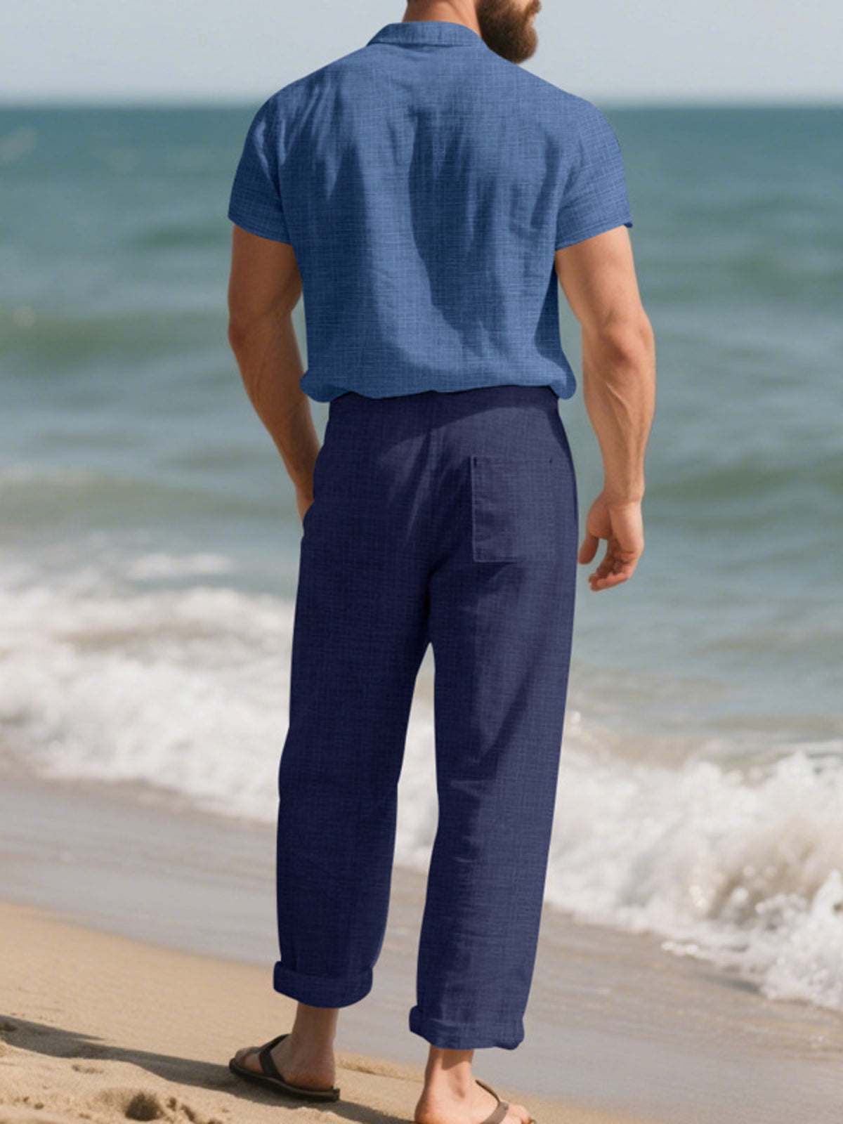 Blue short-sleeve button-up shirt and dark-blue pants set, relaxed fit