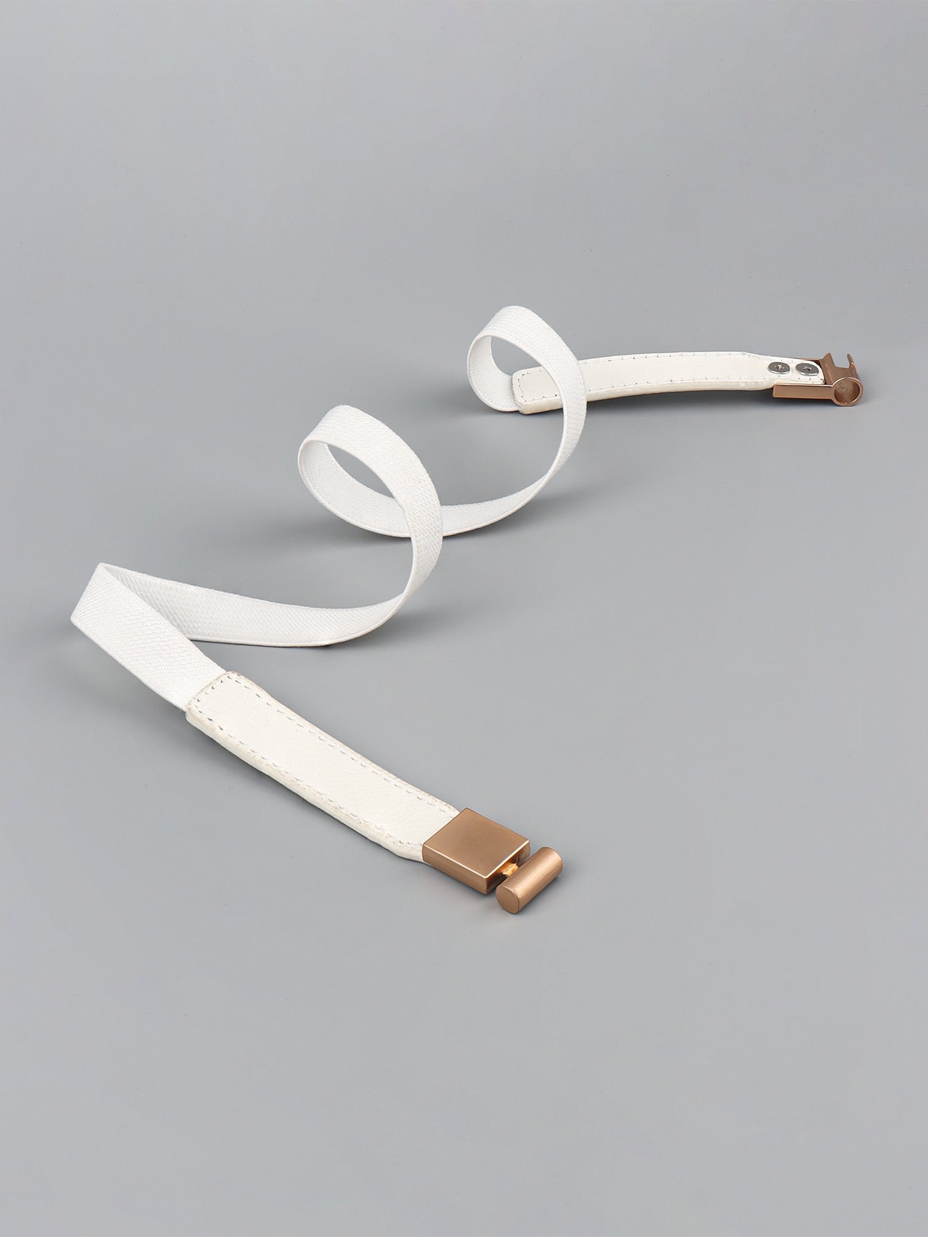 Elastic vegan leather skinny belt, white with rose-gold sliders and loops