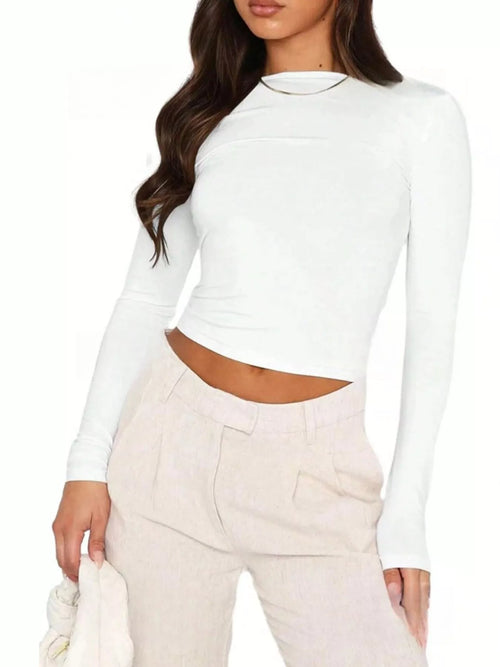 White long-sleeve slim-fit t-shirt with open-back neckline and cropped hem