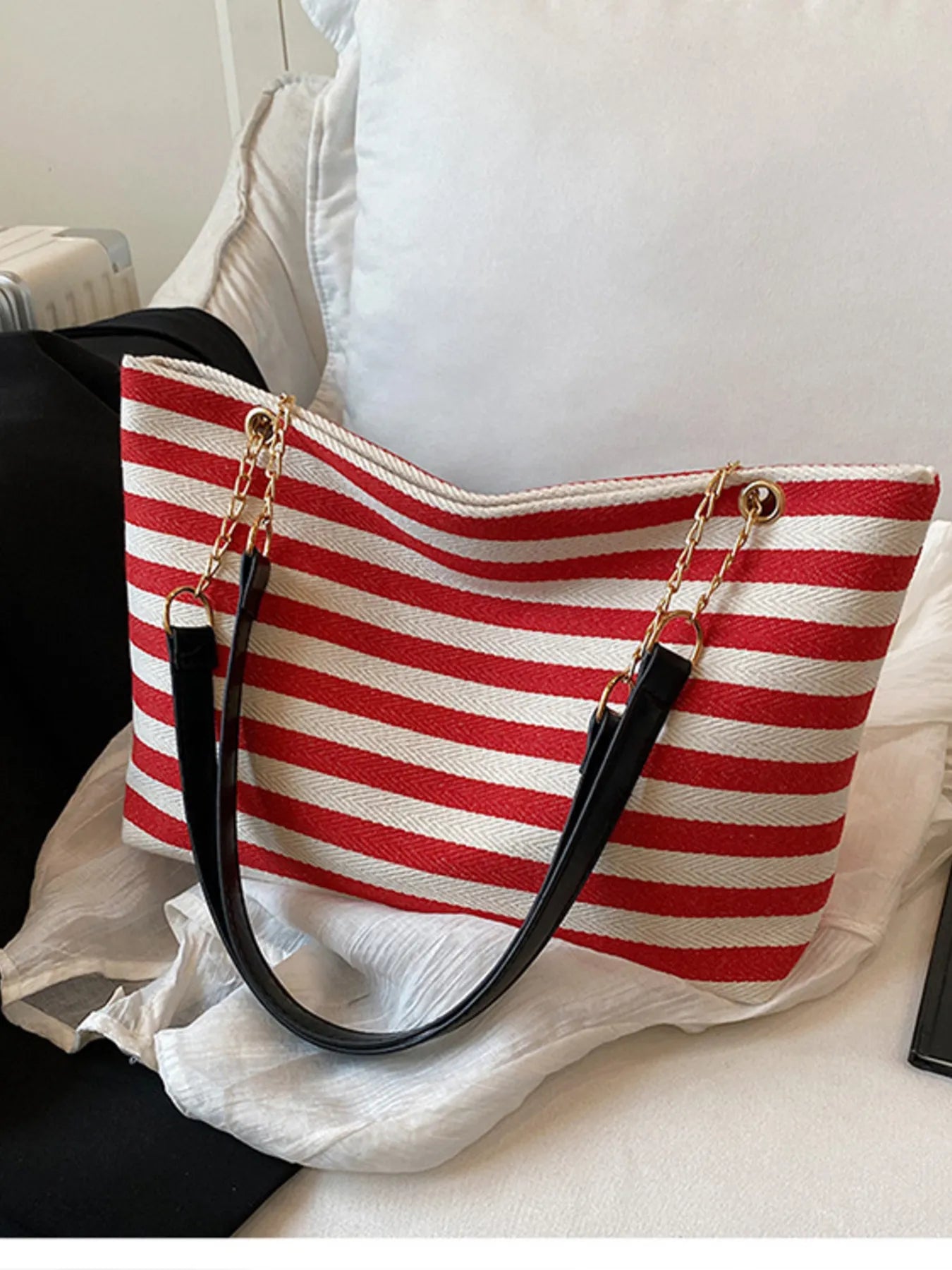 Striped shoulder bag with chain detail, red/white stripes, black side handles