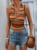 Geometric halter neck cropped tank in orange, black, and cream with V-neck front