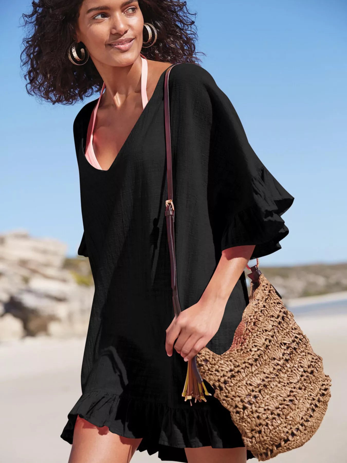 Black ruffled V-neck cover-up dress with flutter sleeves and tiered hem