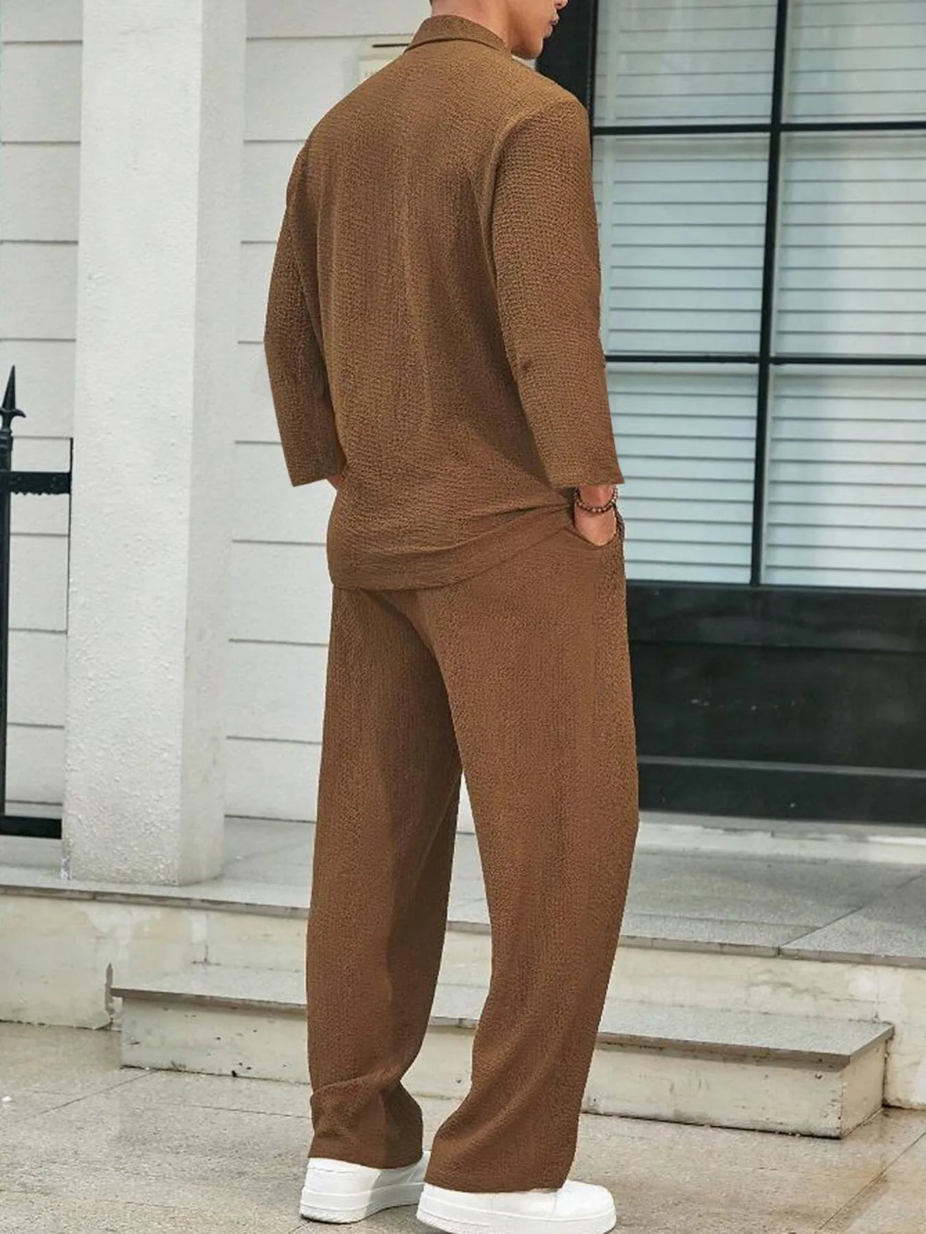 Men's long-sleeve top and pants set in caramel brown, back view with long sleeves and tapered pants
