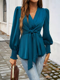 Knot Front Lantern Sleeve Blouse in teal blue with waist tie and ruched cuffs.