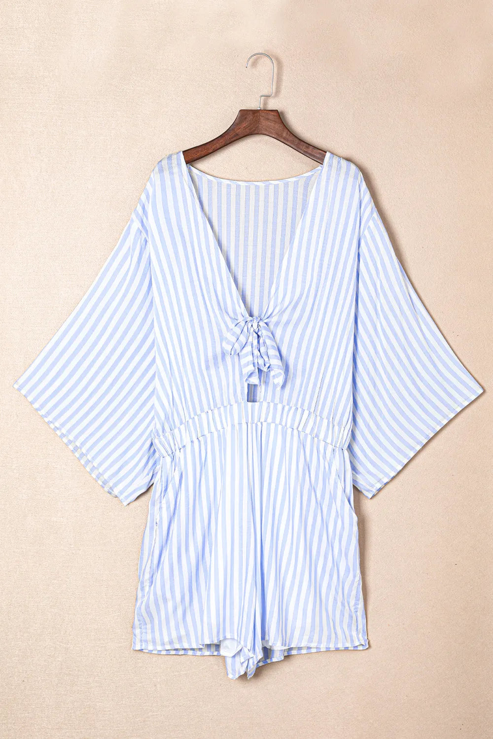 Striped kimono-sleeve romper with drawstring tie and ruffled waist detail, light blue