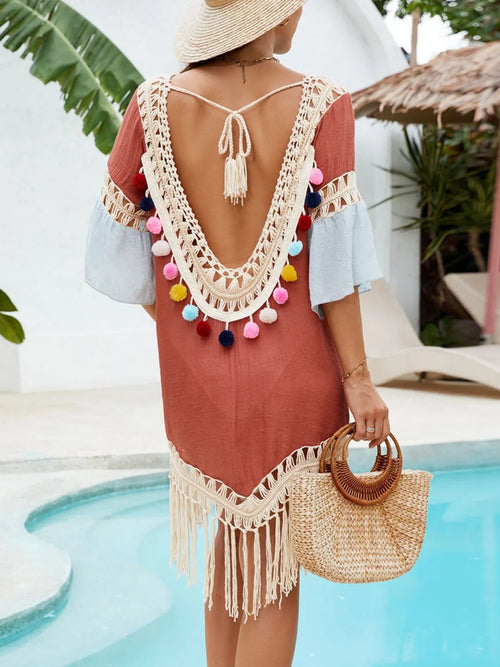 Backless terracotta cover-up with crisscross straps, white crochet V back, tassel accents