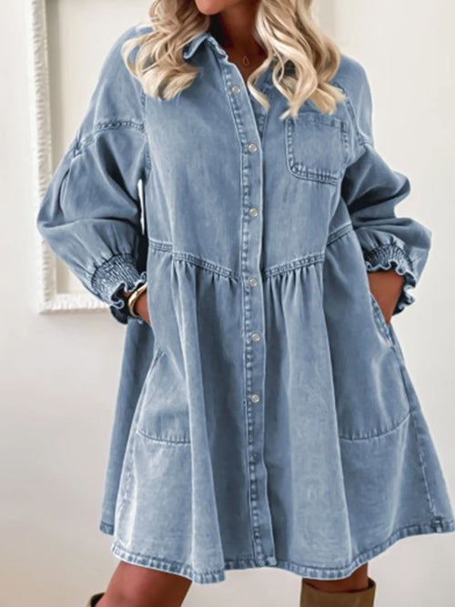 Light blue denim shirt dress with button placket, patch pockets, and gathered waist