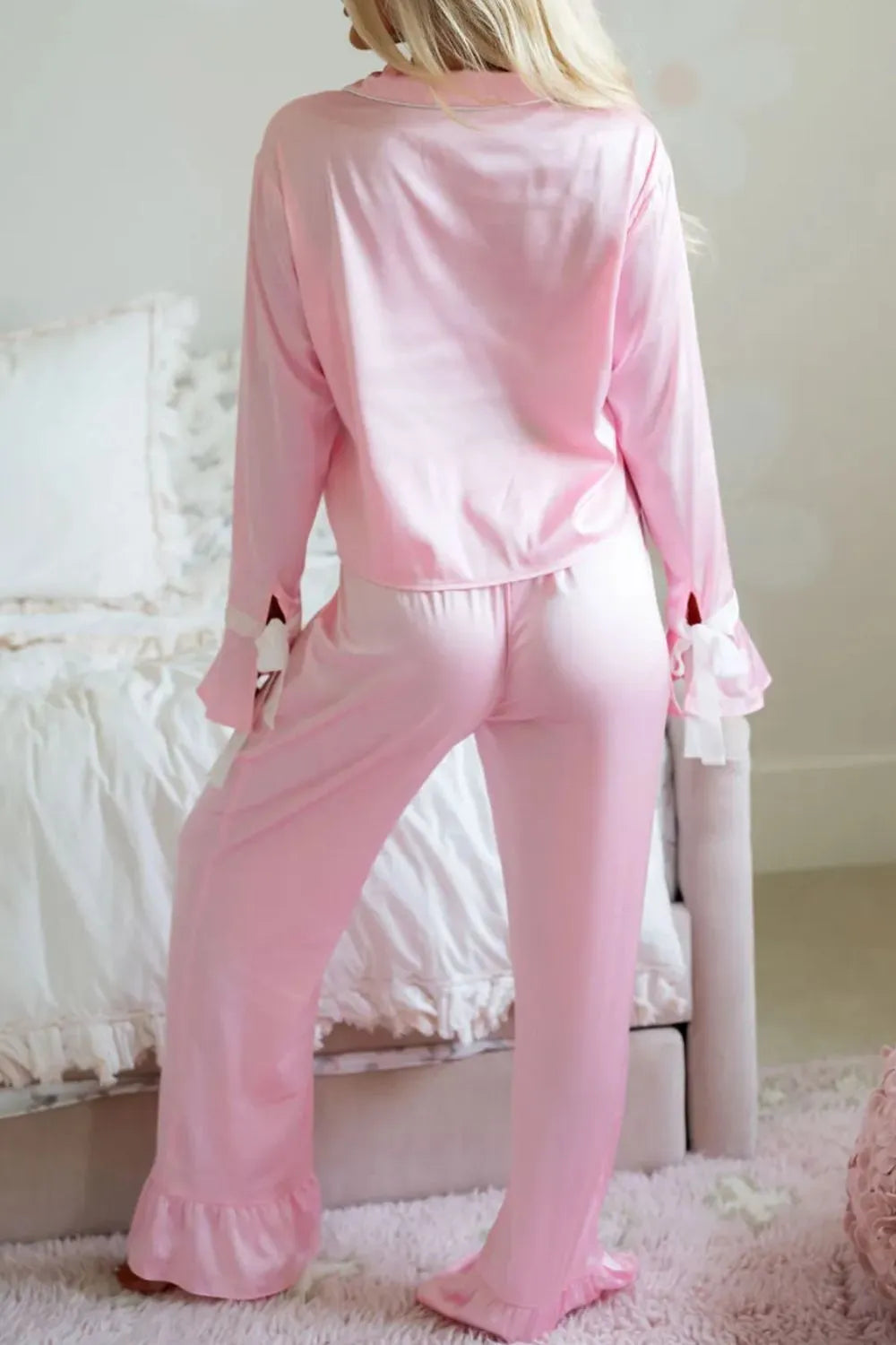 Blush pink long-sleeve lounge top and flared-leg pants set with tie waist
