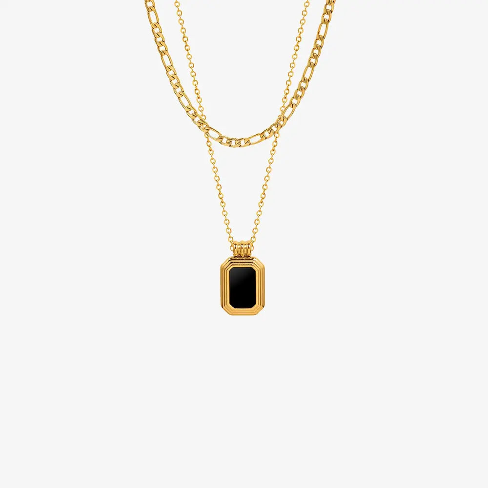 Gold-plated pendant necklace with rectangular black enamel pendant on chain