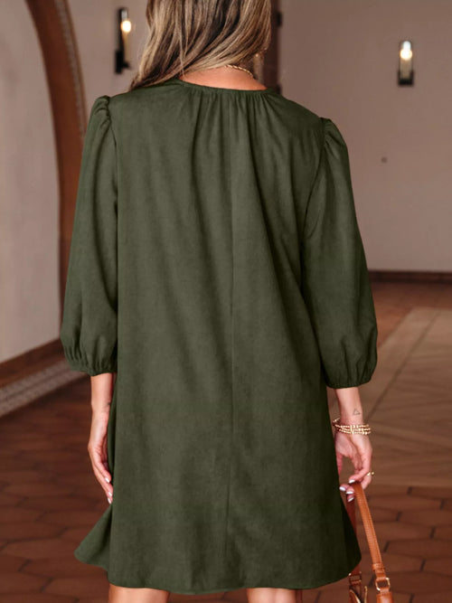 Moss green corduroy mini dress, puff sleeves and gathered pleated back, loose fit