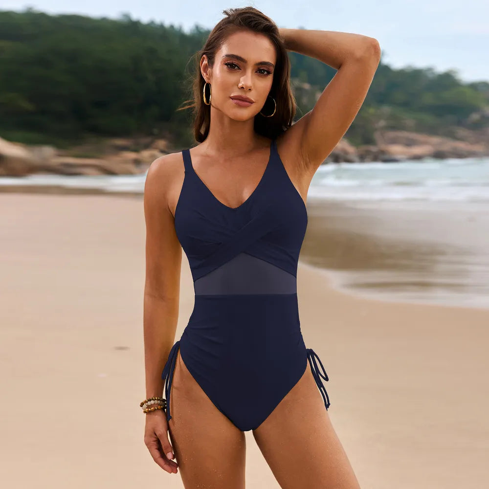 Dark navy ruched one-piece swimsuit with V-neck and drawstring side tie