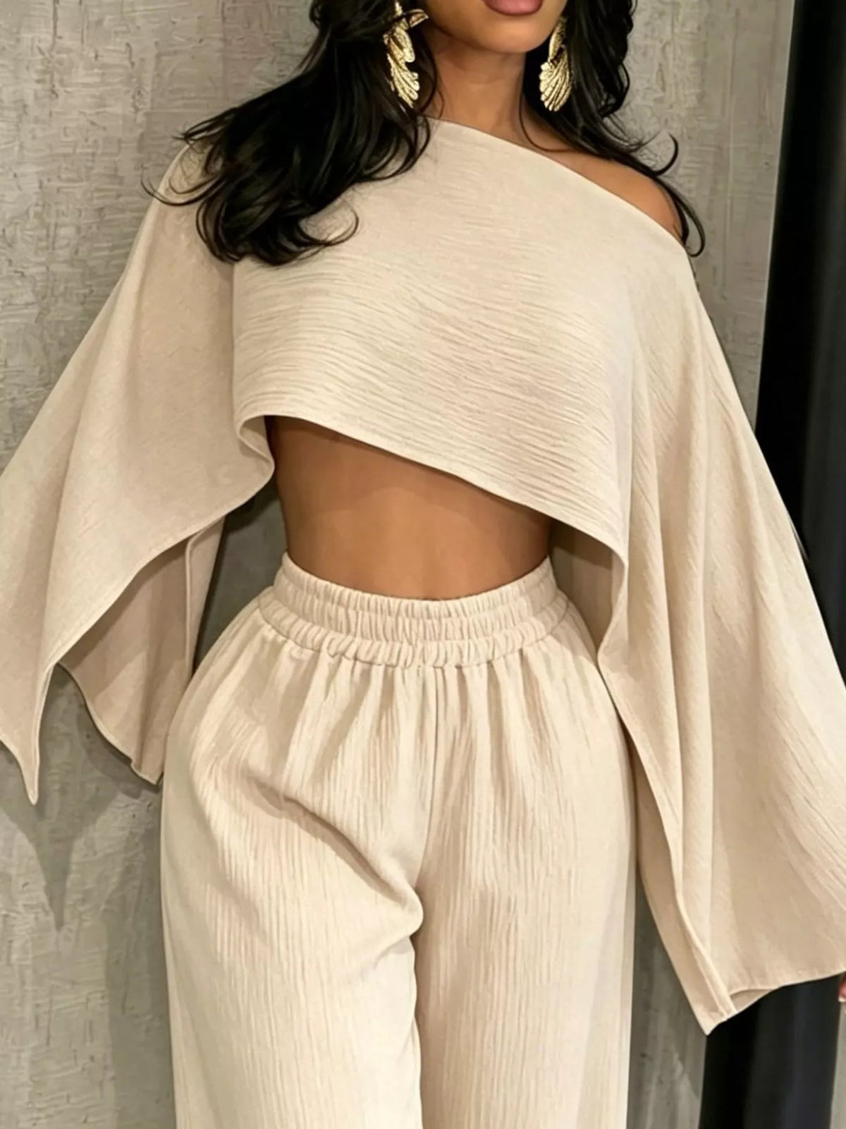 Cream boat-neck crop top with wide-leg pull-on pants, close front view.
