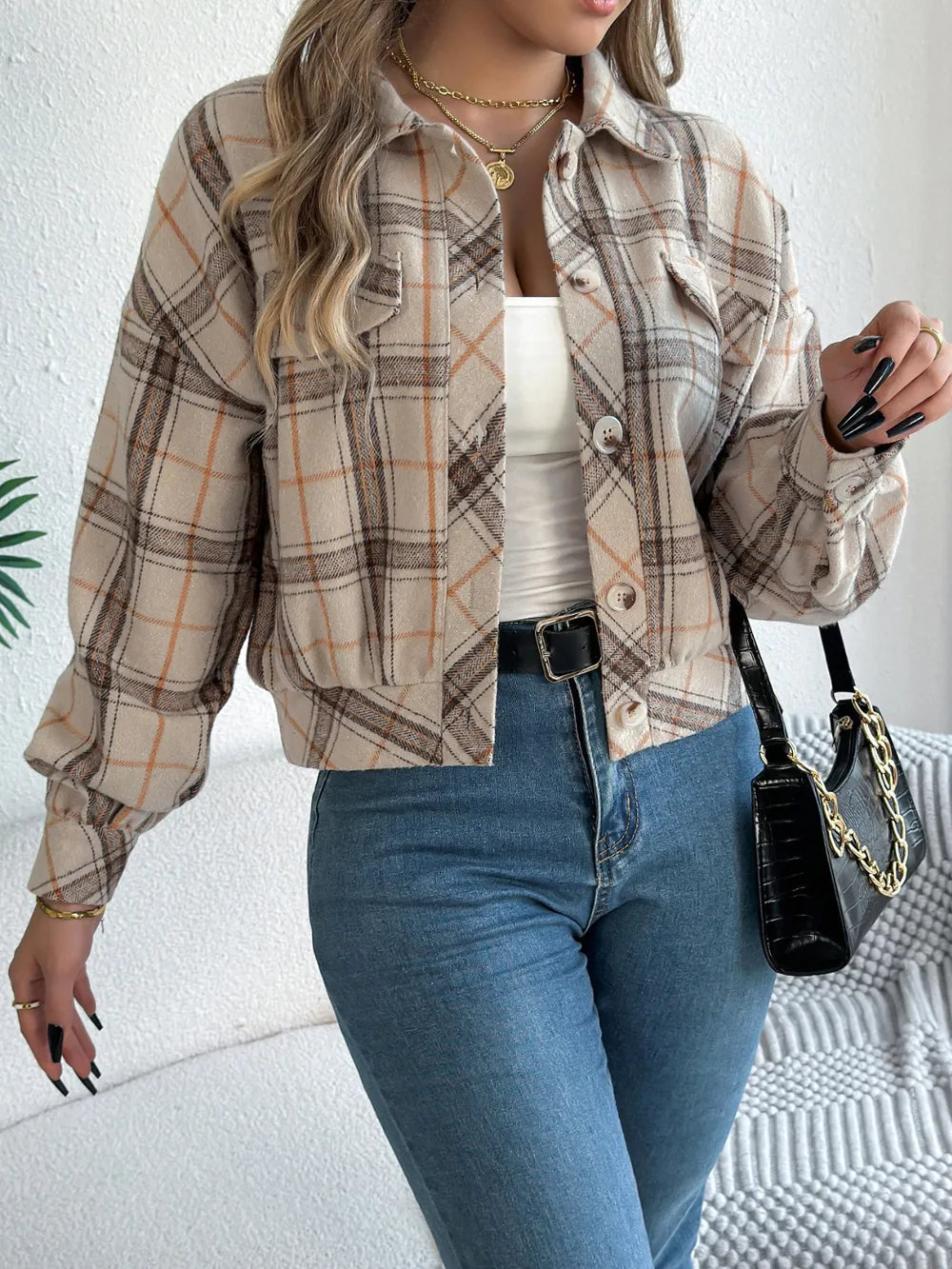 Beige plaid button-up long sleeve jacket with snap front and chest pocket detail