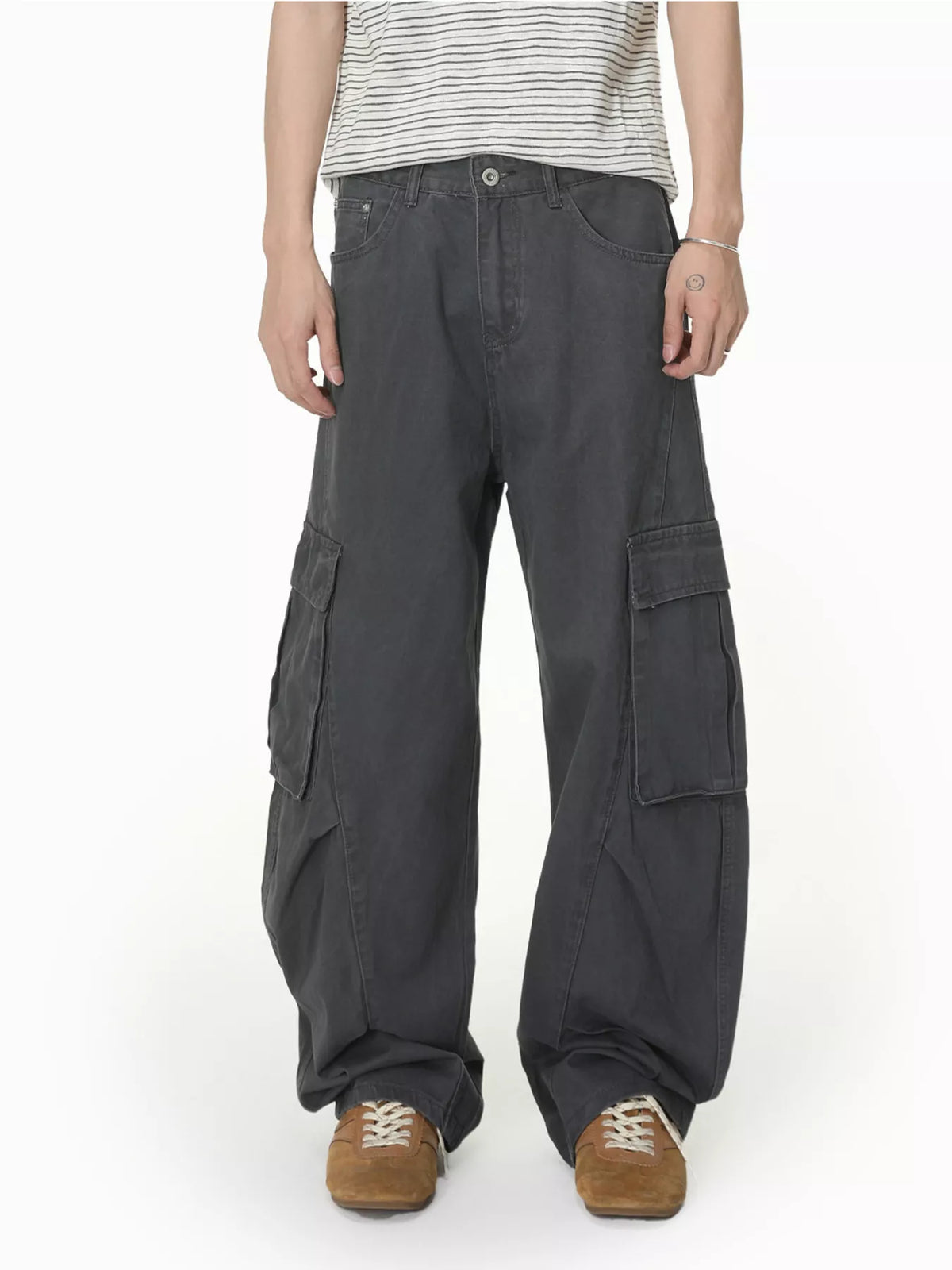Loose-fit dark gray cargo jeans with multiple cargo pockets and cuffed wide legs